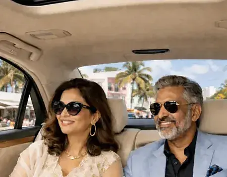 202602201957102_-Couple-in-luxury-car